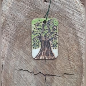 Woodburnt painted charm and or ornament etc